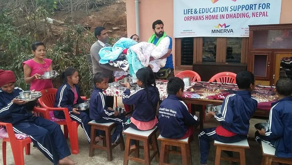 Community and children gathered for a support program